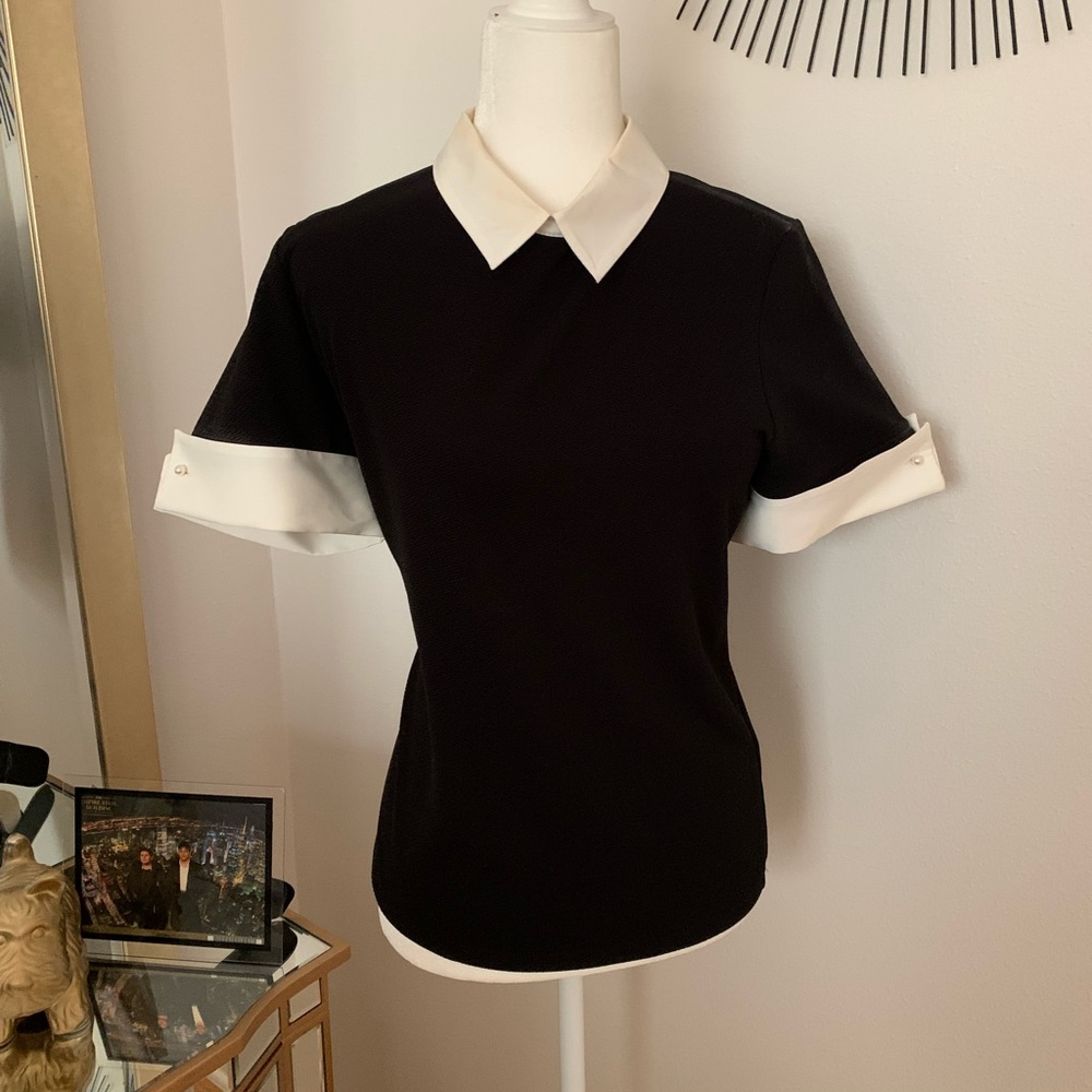 Black and white baby doll top size medium